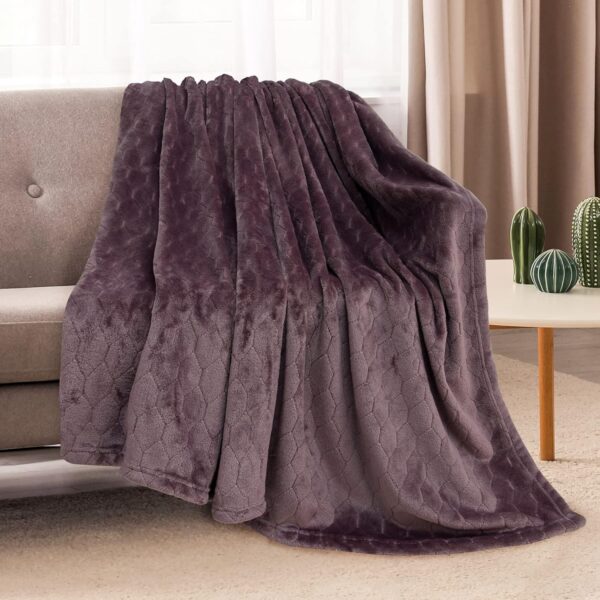 Plush Purple Fleece Throw Blanket - A Cozy Layer for Your Moody Guest Space